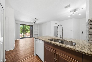 Discover the perfect place to call home! This bright and on MetroWest Golf Club in Florida - for sale on GolfHomes.com, golf home, golf lot