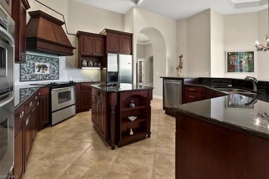 Lakefront and beautifully crafted, this custom-built home sits on Imperial Golf Club in Florida - for sale on GolfHomes.com, golf home, golf lot