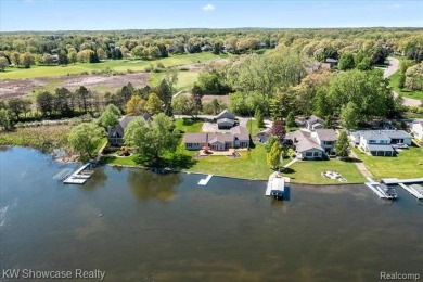 Exquisite Lakefront Ranch on Crooked Lake- Discover the perfect on Oak Pointe Country Club in Michigan - for sale on GolfHomes.com, golf home, golf lot