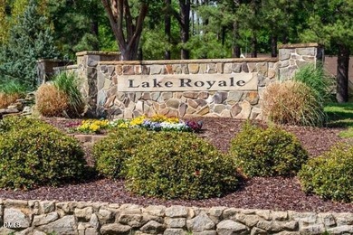 Experience the ultimate resort lifestyle in this move-in ready on River Golf and Country Club at Lake Royale in North Carolina - for sale on GolfHomes.com, golf home, golf lot