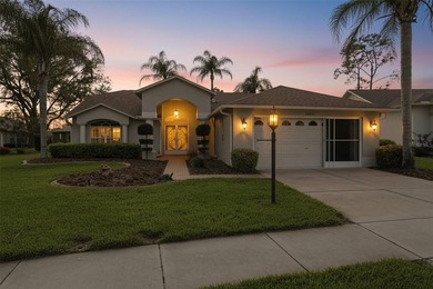 Enjoy relaxed Florida living with golf course views in this on Heritage Pines Country Club in Florida - for sale on GolfHomes.com, golf home, golf lot
