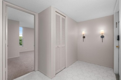 This spacious 5th-floor, 3 Beds, 2 Baths, condo offers 1,500 on Palm-Aire Country Club and Resort - Palms in Florida - for sale on GolfHomes.com, golf home, golf lot