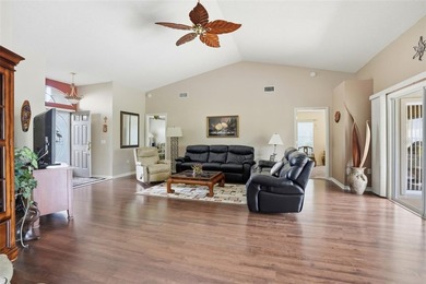 Enjoy relaxed Florida living with golf course views in this on Heritage Pines Country Club in Florida - for sale on GolfHomes.com, golf home, golf lot