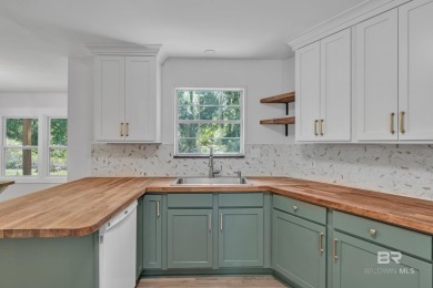 Experience exceptional Creekside living with this 4-bedroom, 2 on Lake Forest Yacht and Country Club in Alabama - for sale on GolfHomes.com, golf home, golf lot