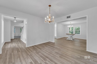 Experience exceptional Creekside living with this 4-bedroom, 2 on Lake Forest Yacht and Country Club in Alabama - for sale on GolfHomes.com, golf home, golf lot
