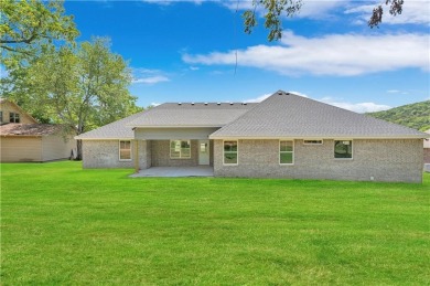 Welcome to this beautiful three-bedroom, two-bathroom new on Holiday Island Executive Golf Course in Arkansas - for sale on GolfHomes.com, golf home, golf lot
