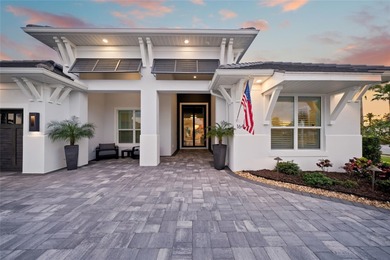 Nestled in the heart of Bradenton's most coveted enclave, this on Ritz-Carlton Members Golf Club in Florida - for sale on GolfHomes.com, golf home, golf lot