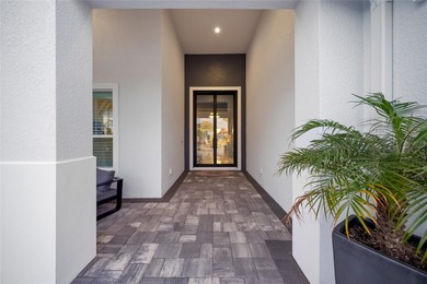 Nestled in the heart of Bradenton's most coveted enclave, this on Ritz-Carlton Members Golf Club in Florida - for sale on GolfHomes.com, golf home, golf lot