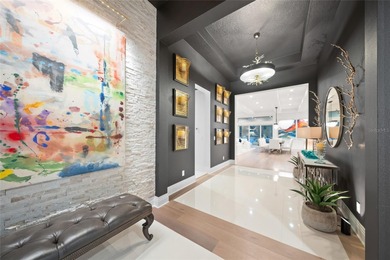 Nestled in the heart of Bradenton's most coveted enclave, this on Ritz-Carlton Members Golf Club in Florida - for sale on GolfHomes.com, golf home, golf lot