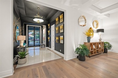 Nestled in the heart of Bradenton's most coveted enclave, this on Ritz-Carlton Members Golf Club in Florida - for sale on GolfHomes.com, golf home, golf lot