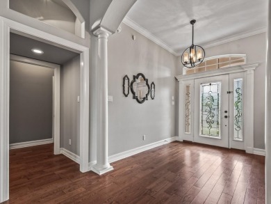 Gorgeous, all brick pool home in the exclusive and gated on Golden Eagle Country Club in Florida - for sale on GolfHomes.com, golf home, golf lot
