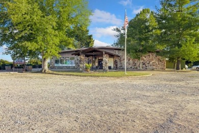 Located just 2 miles from Bull Shoals Lake in Diamond City on Diamond Hills Country Club in Arkansas - for sale on GolfHomes.com, golf home, golf lot