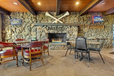 Located just 2 miles from Bull Shoals Lake in Diamond City on Diamond Hills Country Club in Arkansas - for sale on GolfHomes.com, golf home, golf lot