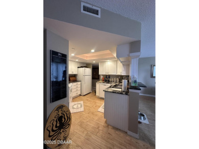 Coastal Living  on the barrier island in the heart of Daytona on Oceans Golf Club in Florida - for sale on GolfHomes.com, golf home, golf lot