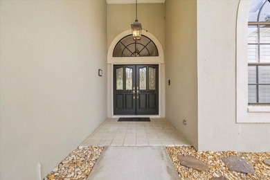 Welcome to Greenhaven II, where this beautiful waterfront on East Lake Woodlands Country Club in Florida - for sale on GolfHomes.com, golf home, golf lot