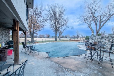 Welcome to this stunning two-story home in the sought-after on Quail Creek Golf and Country Club in Oklahoma - for sale on GolfHomes.com, golf home, golf lot