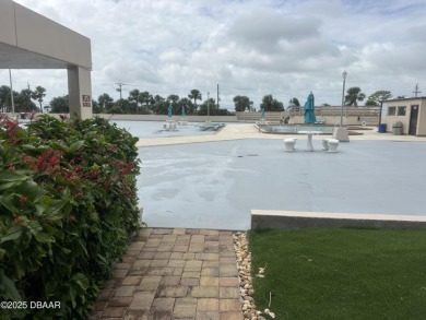 Coastal Living  on the barrier island in the heart of Daytona on Oceans Golf Club in Florida - for sale on GolfHomes.com, golf home, golf lot