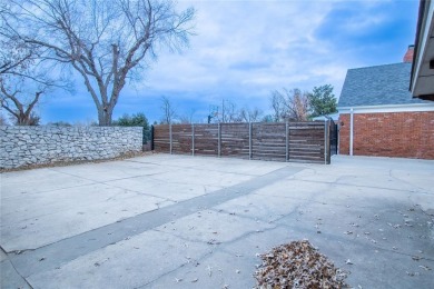 Welcome to this stunning two-story home in the sought-after on Quail Creek Golf and Country Club in Oklahoma - for sale on GolfHomes.com, golf home, golf lot