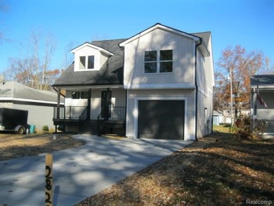 New construction in Highland! This new home offers 3 bedrooms on Highland Hills Golf Course in Michigan - for sale on GolfHomes.com, golf home, golf lot