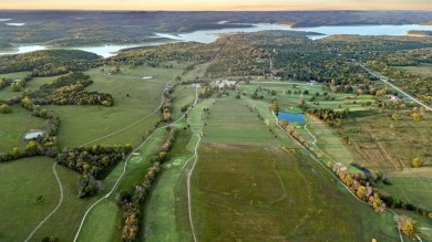 Located just 2 miles from Bull Shoals Lake in Diamond City on Diamond Hills Country Club in Arkansas - for sale on GolfHomes.com, golf home, golf lot