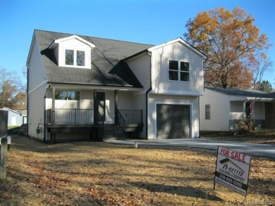 New construction in Highland! This new home offers 3 bedrooms on Highland Hills Golf Course in Michigan - for sale on GolfHomes.com, golf home, golf lot