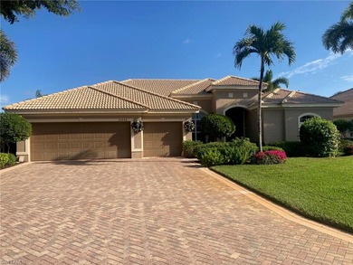 Custom home in the Grande Estates with beautiful golf and lake on  in Florida - for sale on GolfHomes.com, golf home, golf lot