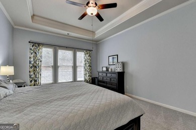 Rarely available primary-on-main floor bedroom plan in highly on Hampton Golf Village in Georgia - for sale on GolfHomes.com, golf home, golf lot