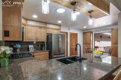 Custom RANCH-STYLE Home is with Finished Walkout Basement on on The Golf Club At Bear Dance in Colorado - for sale on GolfHomes.com, golf home, golf lot