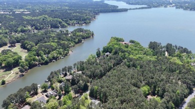 THIS IS A MEMBERSHIP AVAILABLE LOT - Wooded gently sloping to on Reynolds Lake Oconee - The Landing in Georgia - for sale on GolfHomes.com, golf home, golf lot