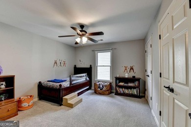 Rarely available primary-on-main floor bedroom plan in highly on Hampton Golf Village in Georgia - for sale on GolfHomes.com, golf home, golf lot