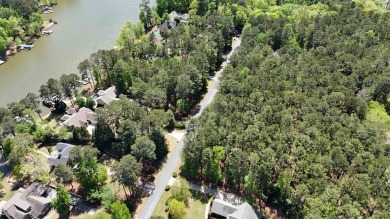 THIS IS A MEMBERSHIP AVAILABLE LOT - Wooded gently sloping to on Reynolds Lake Oconee - The Landing in Georgia - for sale on GolfHomes.com, golf home, golf lot