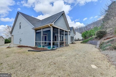 Rarely available primary-on-main floor bedroom plan in highly on Hampton Golf Village in Georgia - for sale on GolfHomes.com, golf home, golf lot