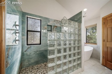 Custom RANCH-STYLE Home is with Finished Walkout Basement on on The Golf Club At Bear Dance in Colorado - for sale on GolfHomes.com, golf home, golf lot