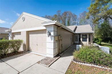 Welcome home to this beautifully updated 2-bedroom, 2-bath on Meadow Oaks Golf and Country Club in Florida - for sale on GolfHomes.com, golf home, golf lot