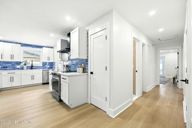 This fully renovated 4-bedroom, 2-bath home blends modern on Jacksonville Beach Golf Course in Florida - for sale on GolfHomes.com, golf home, golf lot