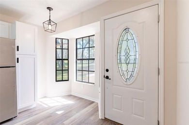 Welcome home to this beautifully updated 2-bedroom, 2-bath on Meadow Oaks Golf and Country Club in Florida - for sale on GolfHomes.com, golf home, golf lot