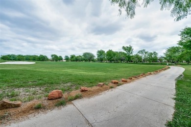 Welcome to 1628 Overwood Drive, a charming single-story home on Frisco Lakes Golf Course in Texas - for sale on GolfHomes.com, golf home, golf lot