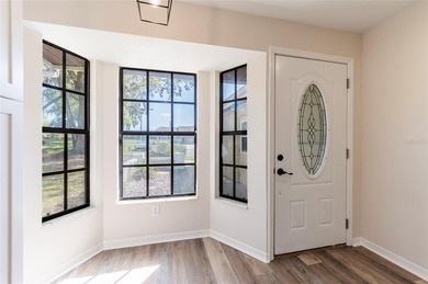 Welcome home to this beautifully updated 2-bedroom, 2-bath on Meadow Oaks Golf and Country Club in Florida - for sale on GolfHomes.com, golf home, golf lot