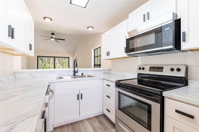 Welcome home to this beautifully updated 2-bedroom, 2-bath on Meadow Oaks Golf and Country Club in Florida - for sale on GolfHomes.com, golf home, golf lot