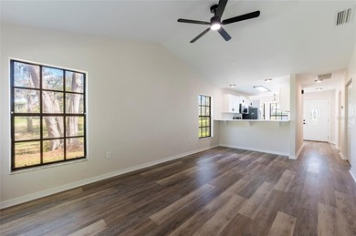 Welcome home to this beautifully updated 2-bedroom, 2-bath on Meadow Oaks Golf and Country Club in Florida - for sale on GolfHomes.com, golf home, golf lot