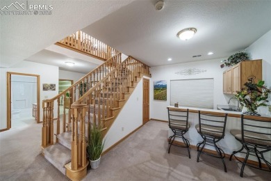 Custom RANCH-STYLE Home is with Finished Walkout Basement on on The Golf Club At Bear Dance in Colorado - for sale on GolfHomes.com, golf home, golf lot