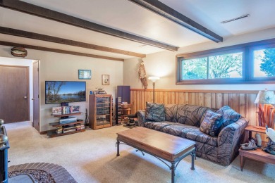 This bi-level home is located on a tranquil 1-acre lot at the on Mascoutin Country Club in Wisconsin - for sale on GolfHomes.com, golf home, golf lot