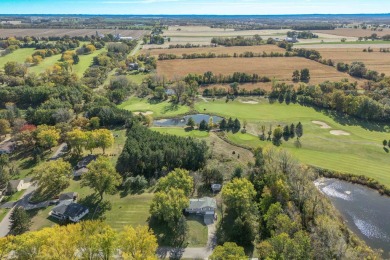 This bi-level home is located on a tranquil 1-acre lot at the on Mascoutin Country Club in Wisconsin - for sale on GolfHomes.com, golf home, golf lot