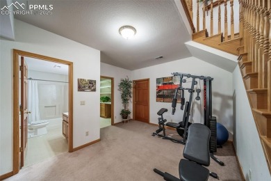 Custom RANCH-STYLE Home is with Finished Walkout Basement on on The Golf Club At Bear Dance in Colorado - for sale on GolfHomes.com, golf home, golf lot