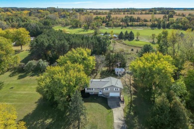 This bi-level home is located on a tranquil 1-acre lot at the on Mascoutin Country Club in Wisconsin - for sale on GolfHomes.com, golf home, golf lot