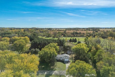 This bi-level home is located on a tranquil 1-acre lot at the on Mascoutin Country Club in Wisconsin - for sale on GolfHomes.com, golf home, golf lot