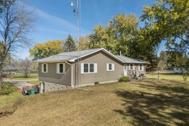 This bi-level home is located on a tranquil 1-acre lot at the on Mascoutin Country Club in Wisconsin - for sale on GolfHomes.com, golf home, golf lot