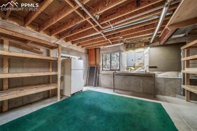Custom RANCH-STYLE Home is with Finished Walkout Basement on on The Golf Club At Bear Dance in Colorado - for sale on GolfHomes.com, golf home, golf lot