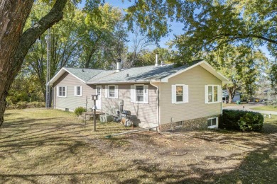 This bi-level home is located on a tranquil 1-acre lot at the on Mascoutin Country Club in Wisconsin - for sale on GolfHomes.com, golf home, golf lot