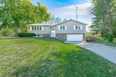 This bi-level home is located on a tranquil 1-acre lot at the on Mascoutin Country Club in Wisconsin - for sale on GolfHomes.com, golf home, golf lot